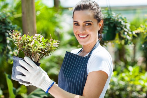 Gardener assessing garden area for safety before work